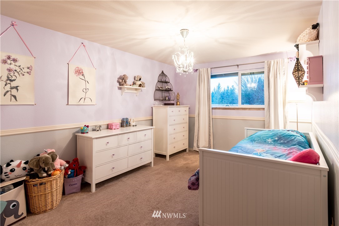 15543 Southeast 169th Street Renton, WA 98058 - Photo 21 of 35 a room with cabinets and window