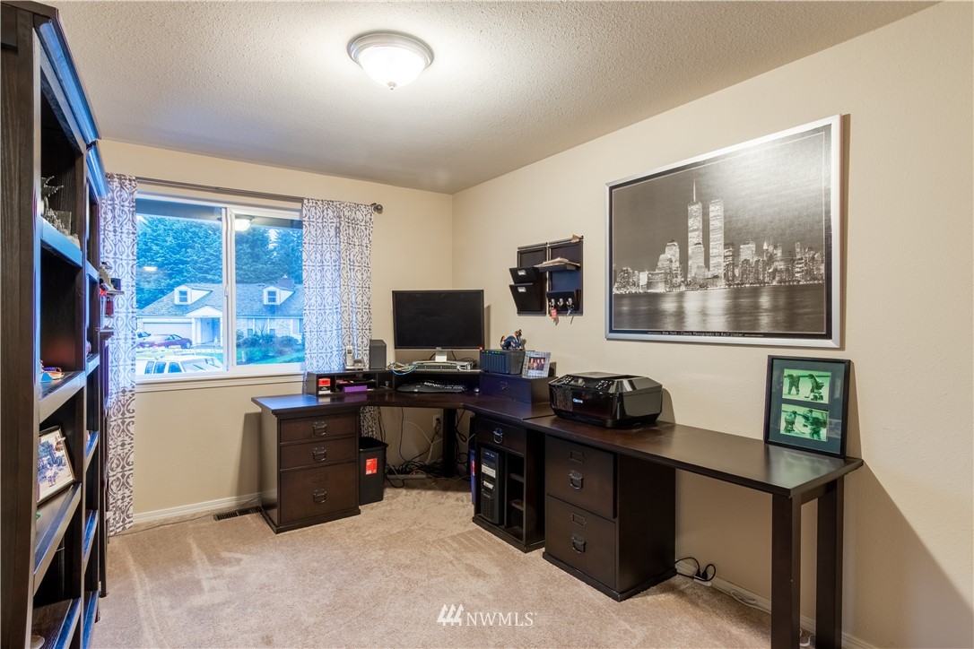 15543 Southeast 169th Street Renton, WA 98058 - Photo 26 of 35 a view of a workspace with furniture and a window
