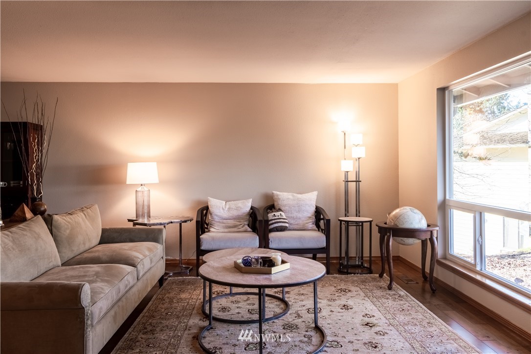 15543 Southeast 169th Street Renton, WA 98058 - Photo 4 of 35 a living room with furniture and a window