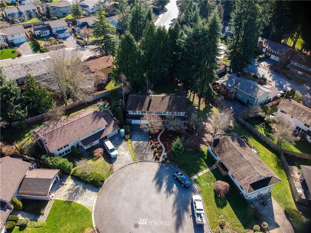 15543 Southeast 169th Street Renton, WA 98058 - Photo 33 of 35 an aerial view of a house with a yard and lake view