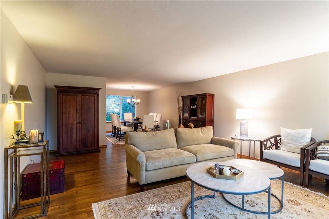 15543 Southeast 169th Street Renton, WA 98058 - Photo 5 of 35 a living room with furniture and wooden floor