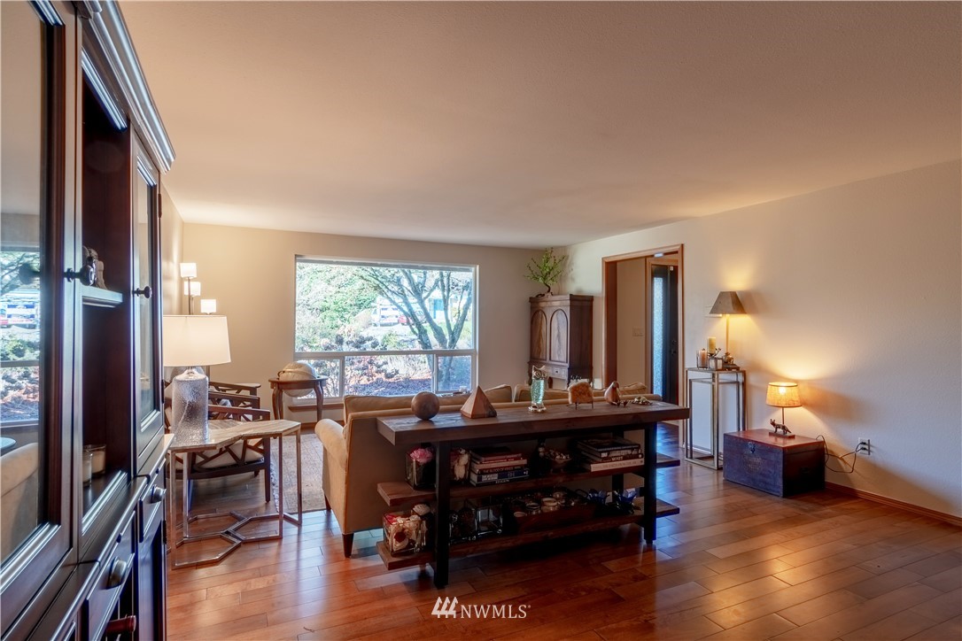 15543 Southeast 169th Street Renton, WA 98058 - Photo 6 of 35 a room with furniture and a wooden floor