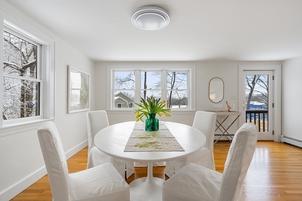 11 Oakencroft Road Wellesley, MA 02482 - Photo 9 of 28 a view of a dining room with furniture window and wooden floor