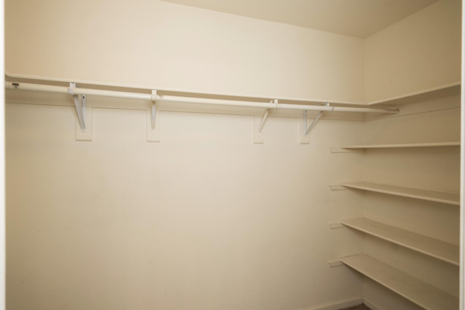 793 Applegate Avenue Clovis, CA 93611 - Photo 16 of 20 a view of an empty walk in closet