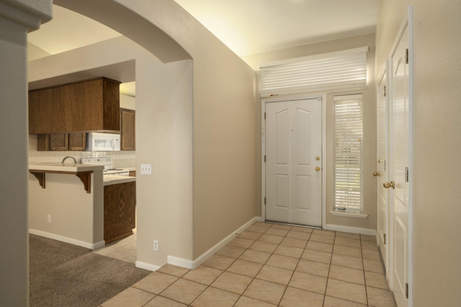 793 Applegate Avenue Clovis, CA 93611 - Photo 5 of 20 a view of a kitchen from the hallway