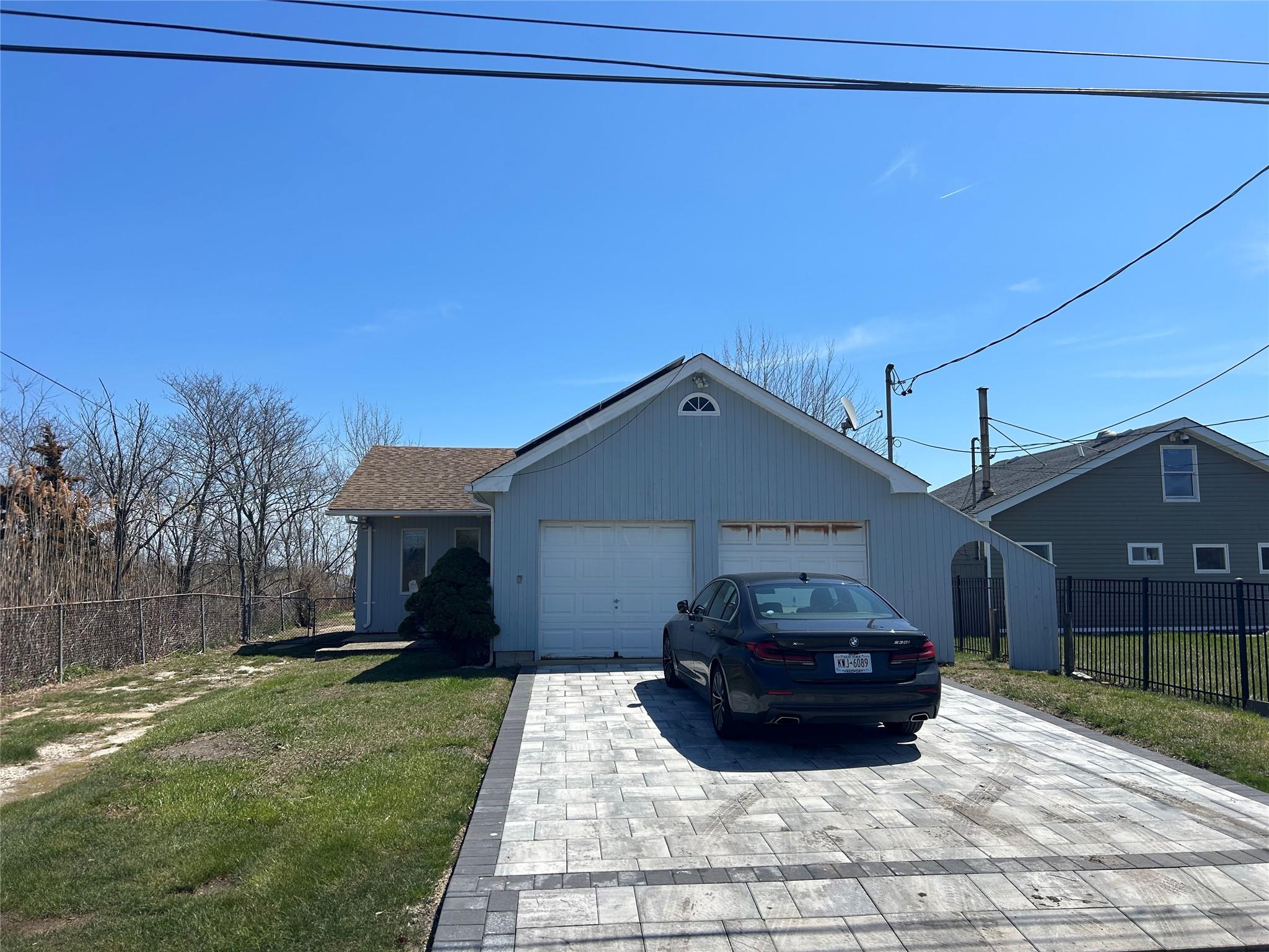 a view of a back yard of the house
