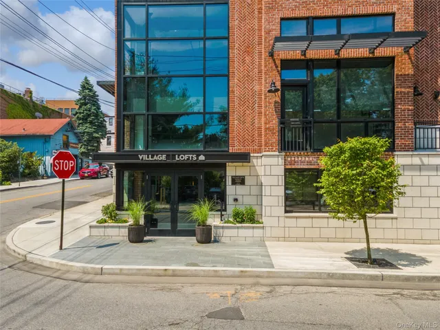 a view of a house with a street