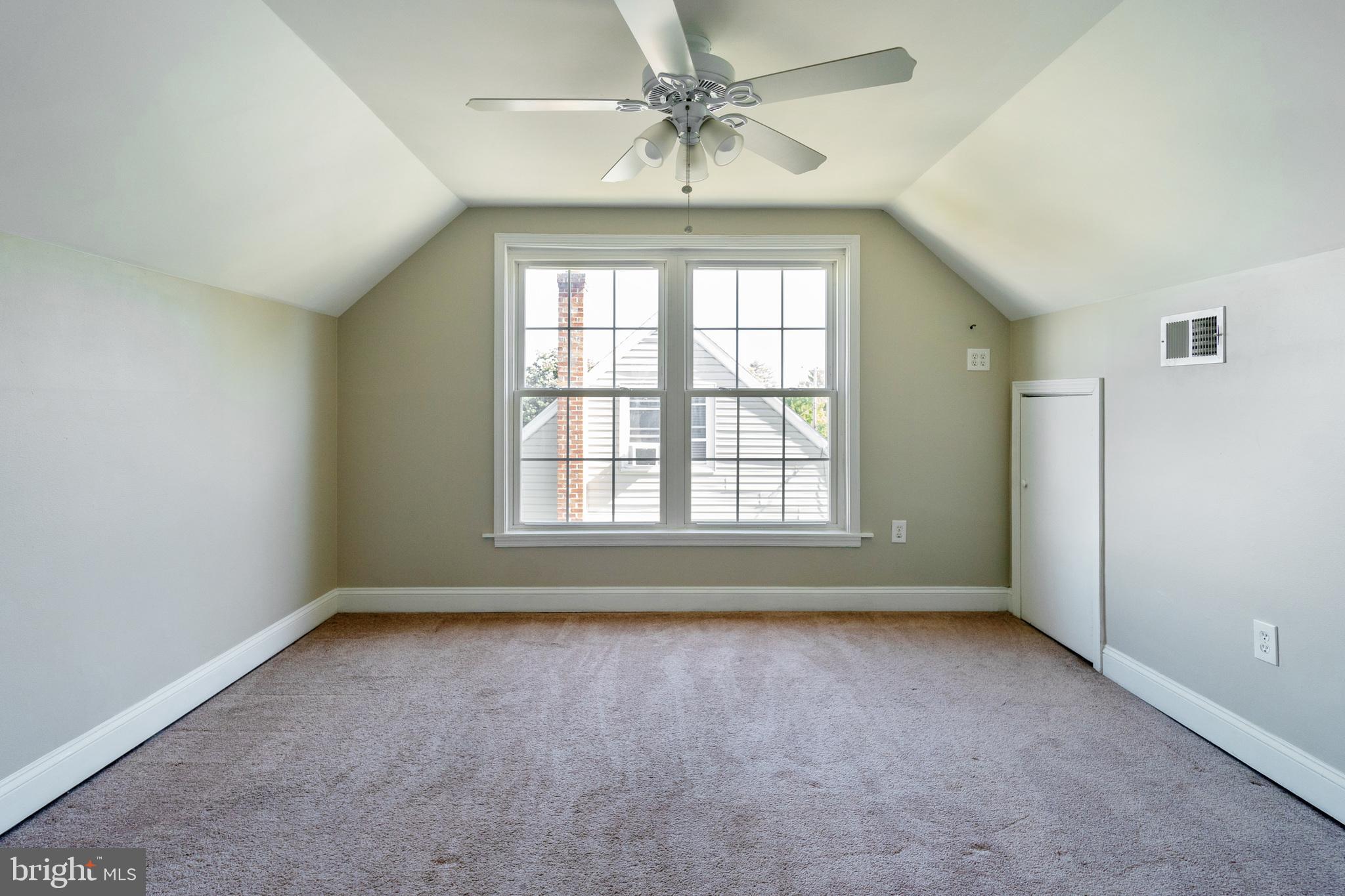 2810 Manoff Road Halethorpe, MD 21227 - Photo 15 of 27 an empty room with chandelier fan and windows