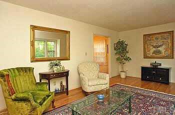 4409 Old Colony Road Raleigh, NC 27613 - Photo 3 of 10 a living room with furniture and a couch