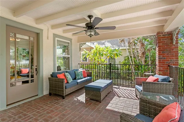 a living room with a fireplace and a table