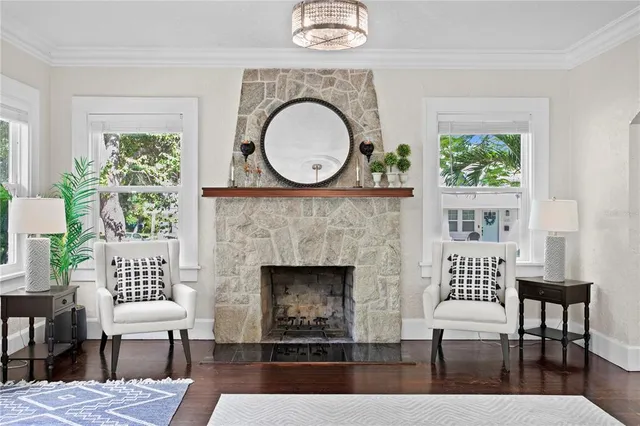 a living room with furniture and a rug
