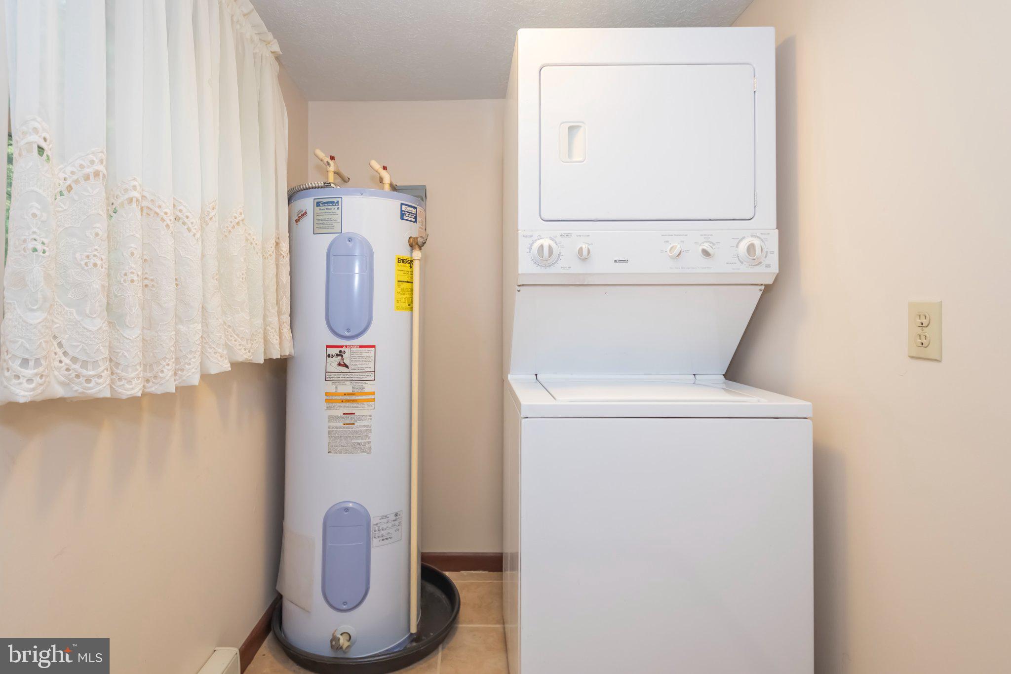 206 Mayhew Inn Road Oakland, MD 21550 - Photo 18 of 31 a utility room with dryer and washer
