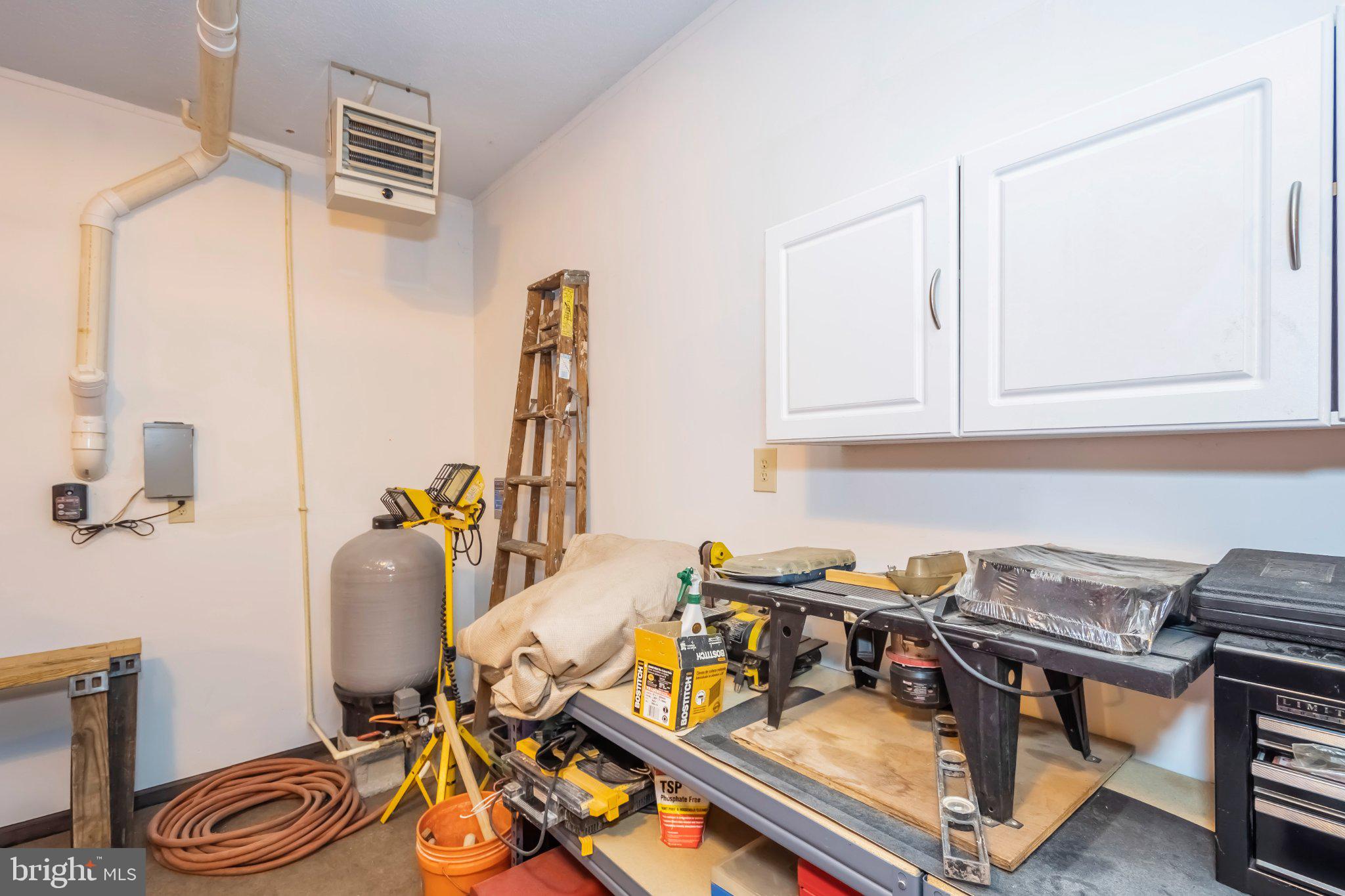 206 Mayhew Inn Road Oakland, MD 21550 - Photo 20 of 31 a view of a workspace with furniture