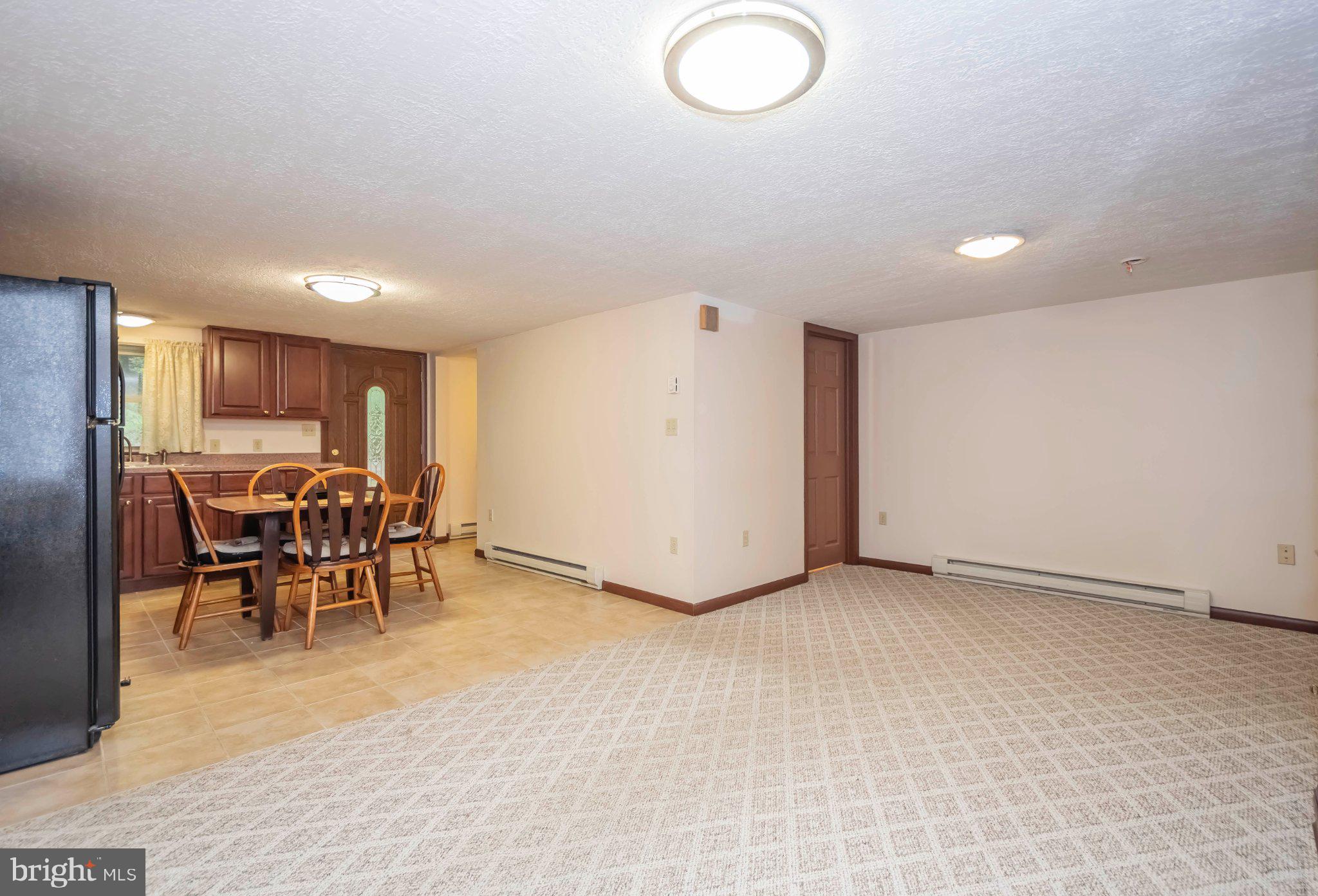 206 Mayhew Inn Road Oakland, MD 21550 - Photo 10 of 31 a view of a room with chairs