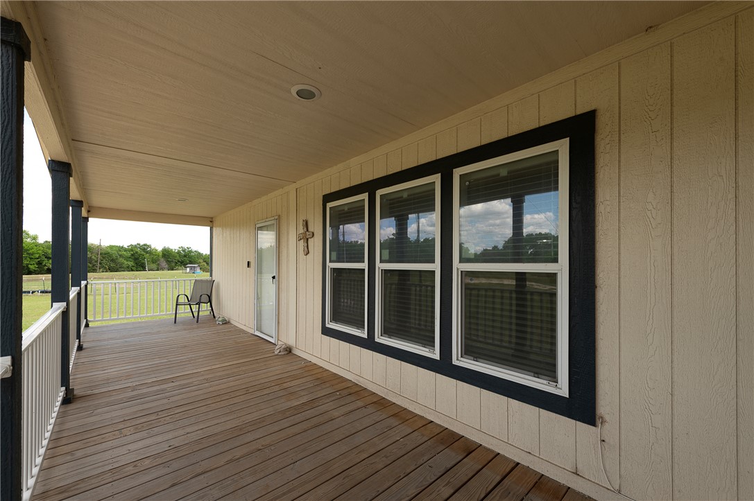 10976 Whiterock Road Bremond, TX 76629 - Photo 7 of 42 a view of a house with a swimming pool