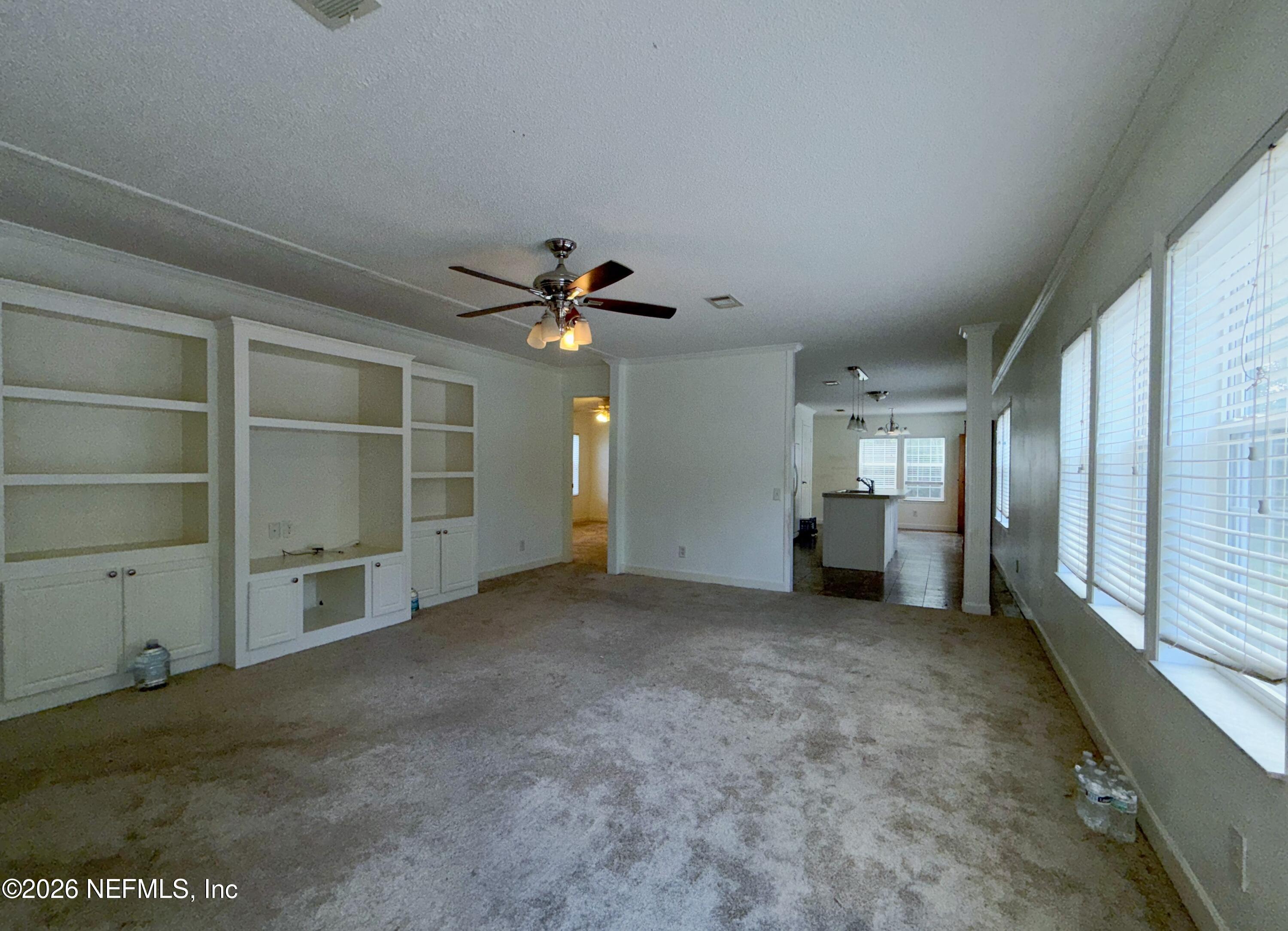 136 Short Pine Road Hawthorne, FL 32640 - Photo 11 of 39 a view of empty room with a fireplace