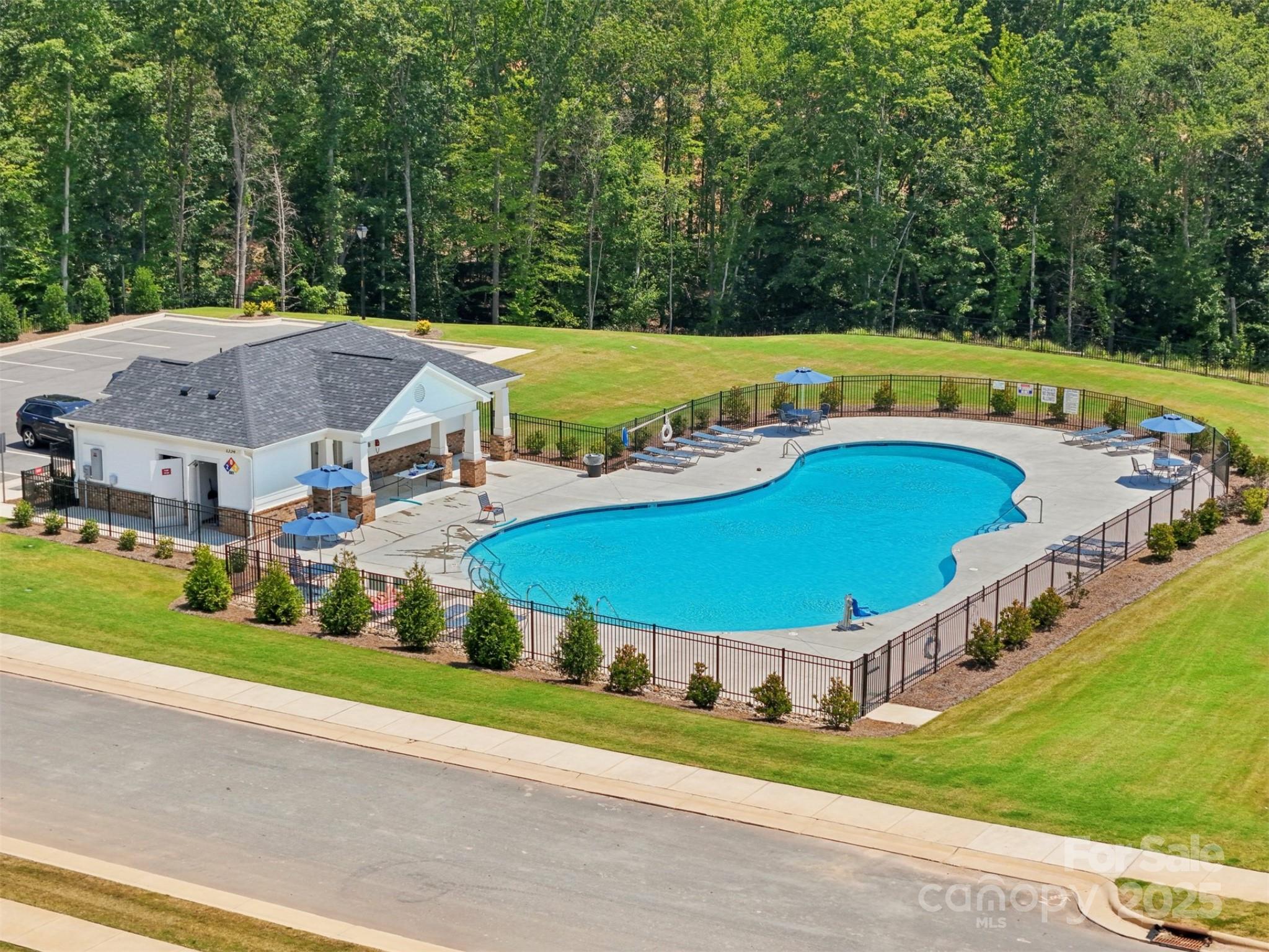 1257 30th St Lane Northeast Conover, NC 28613 - Photo 3 of 3 an aerial view of a house with a garden and swimming pool