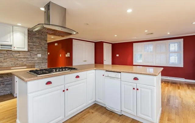a kitchen with granite countertop a stove and a sink