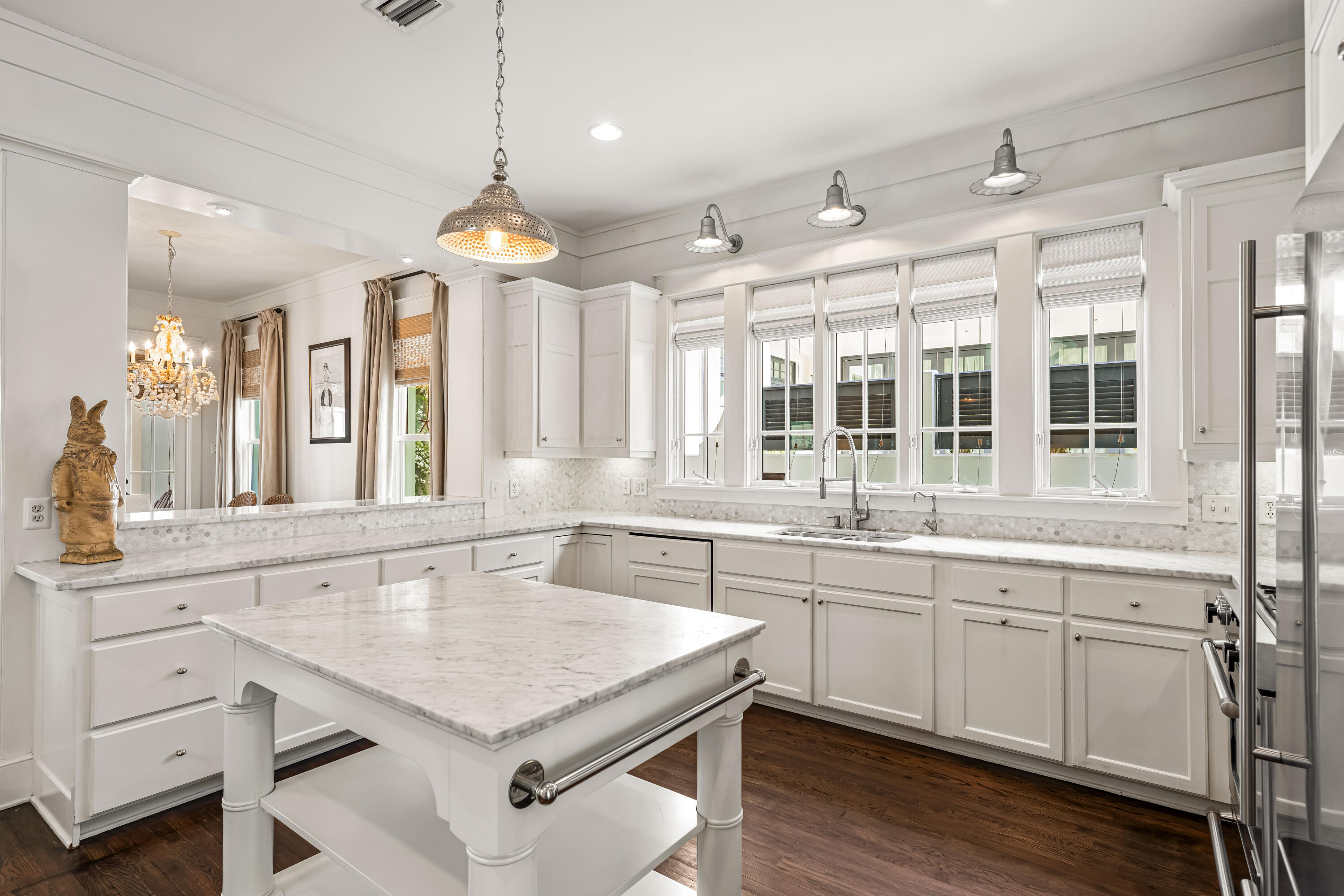 90 Atticus Road Rosemary Beach, FL 32461 - Photo 11 of 51 a kitchen with granite countertop cabinets a sink dishwasher a dining table and chairs