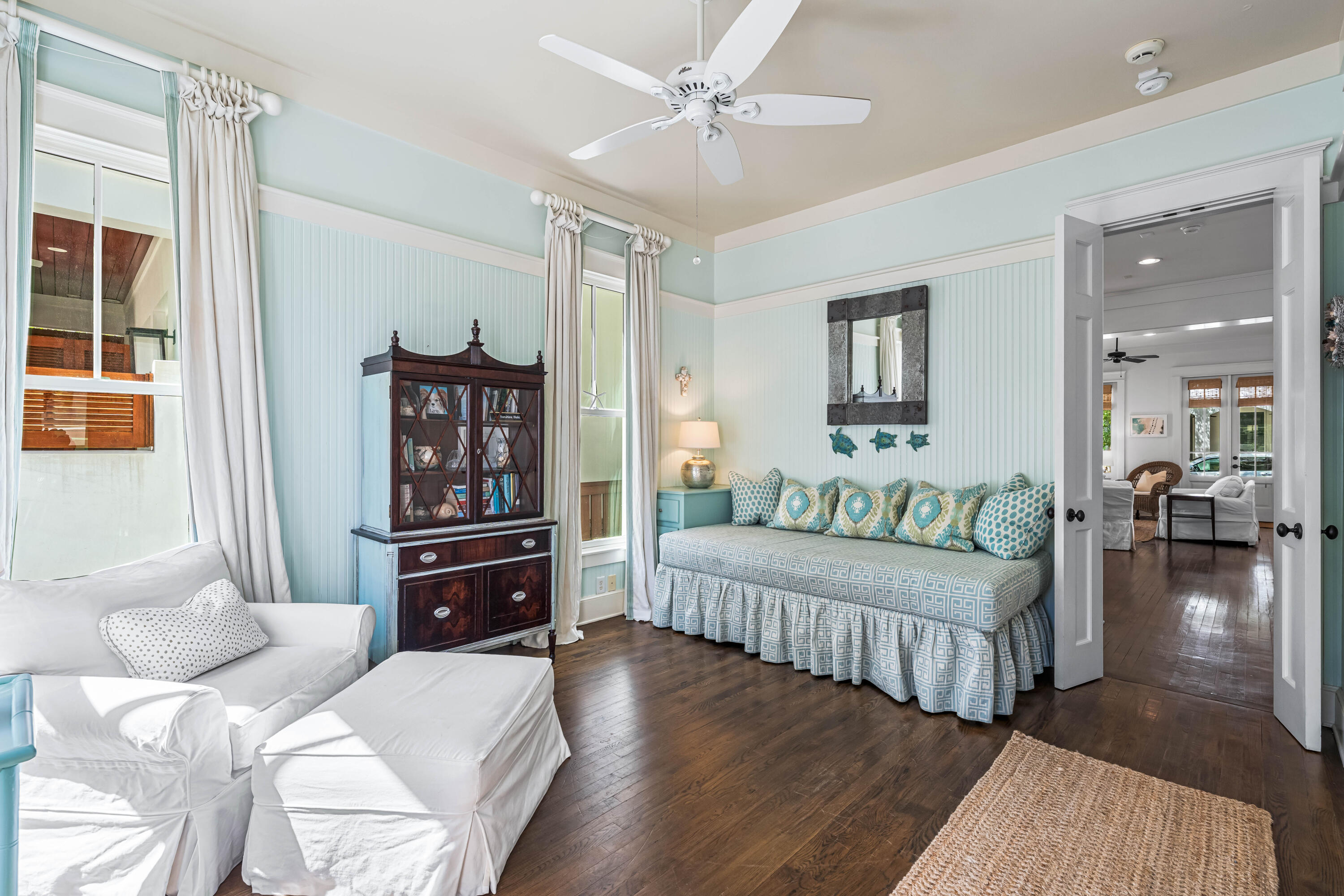 90 Atticus Road Rosemary Beach, FL 32461 - Photo 16 of 51 a living room with furniture and wooden floor