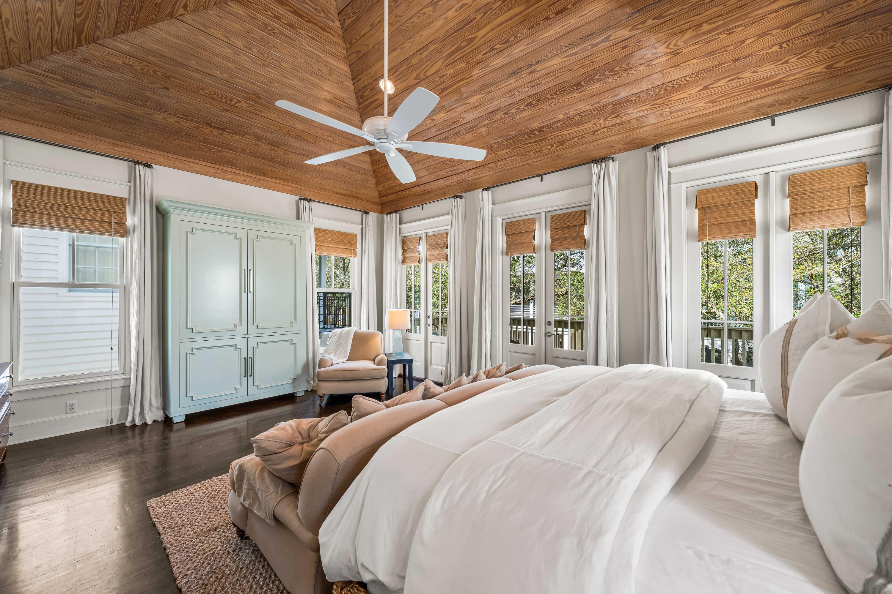 90 Atticus Road Rosemary Beach, FL 32461 - Photo 18 of 51 a bedroom with furniture and large windows