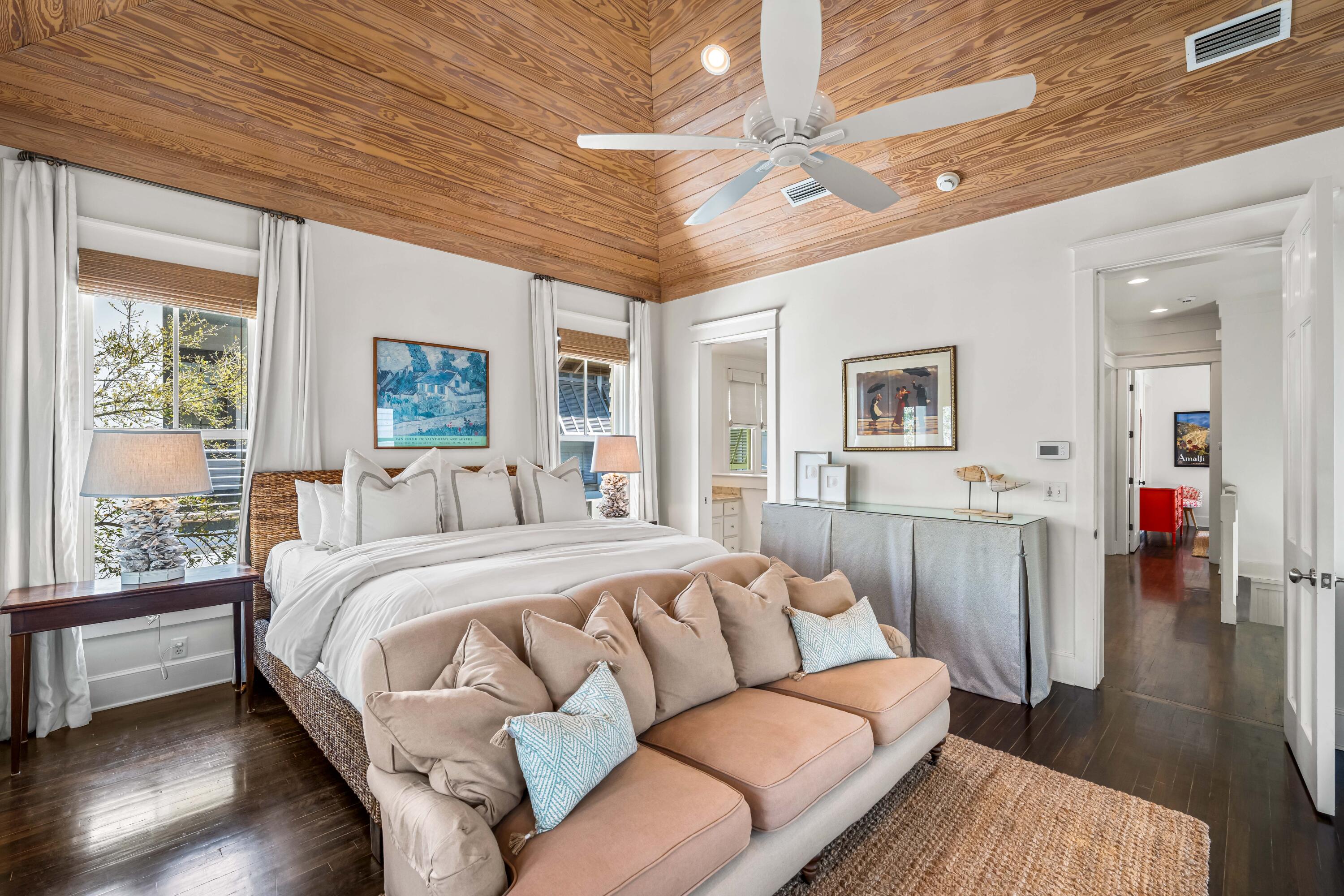90 Atticus Road Rosemary Beach, FL 32461 - Photo 20 of 51 a bedroom with a large bed couch and a window