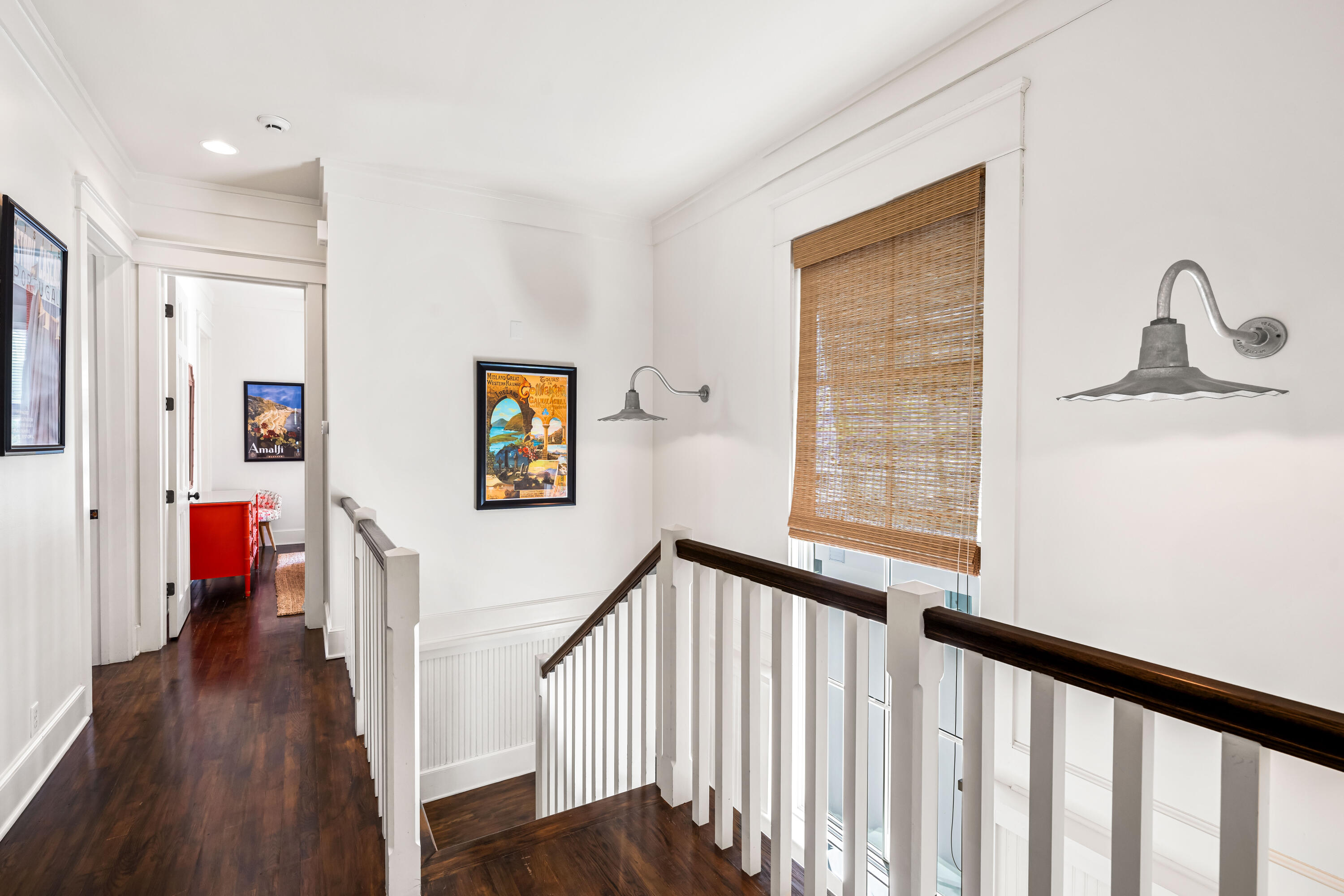 90 Atticus Road Rosemary Beach, FL 32461 - Photo 25 of 51 a view of a hallway with wooden floor and dining room