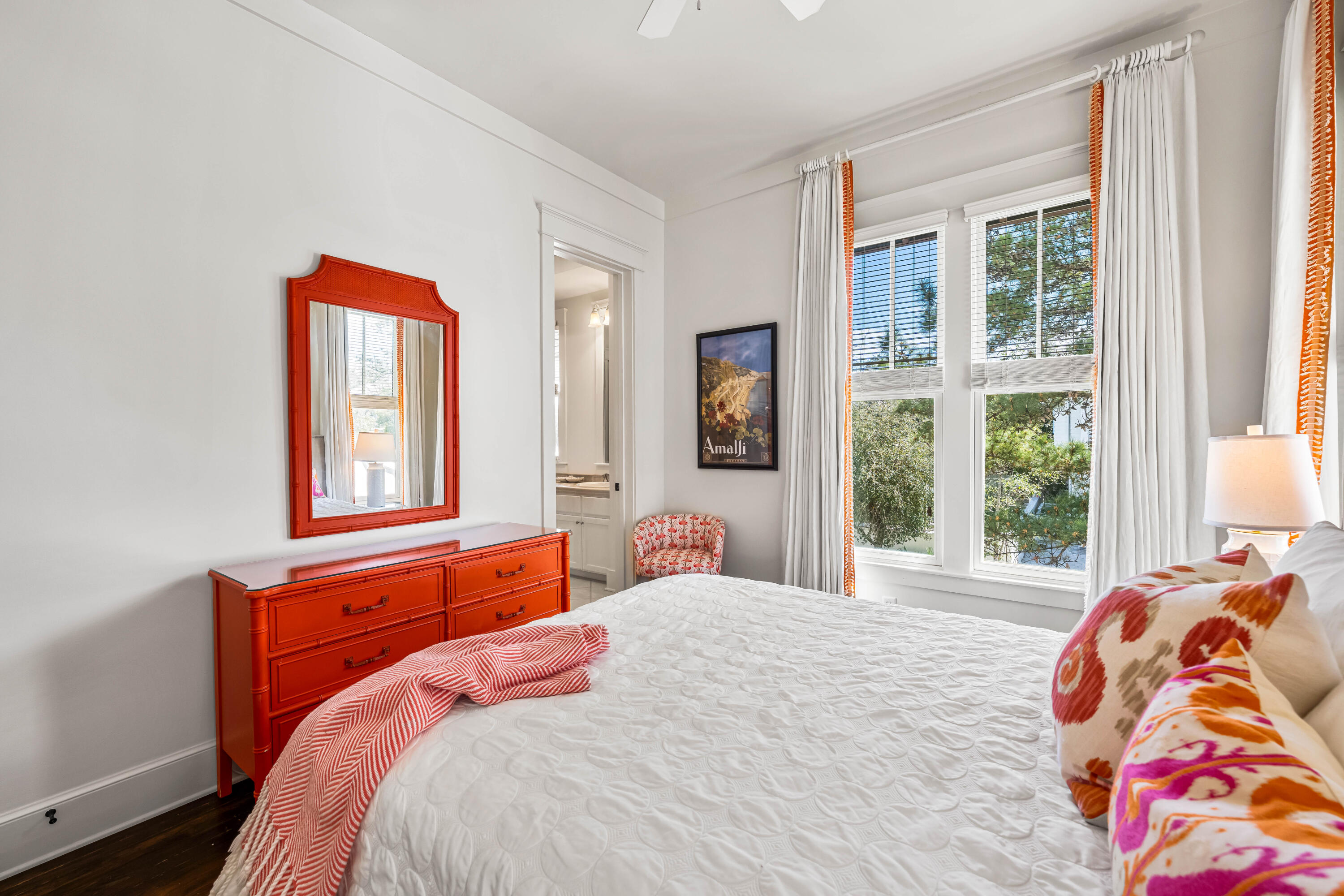 90 Atticus Road Rosemary Beach, FL 32461 - Photo 27 of 51 a bedroom with a bed and window with chair