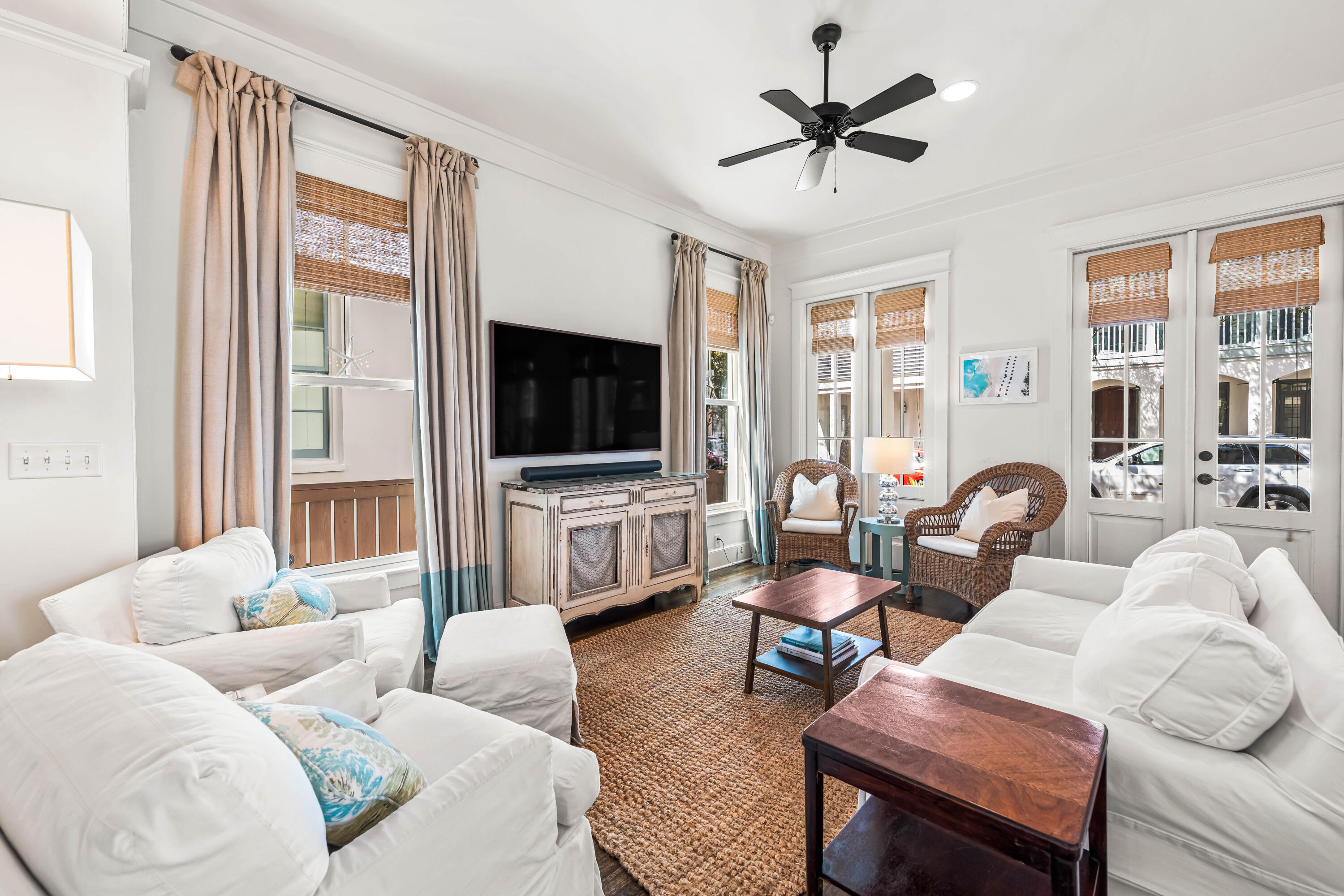 90 Atticus Road Rosemary Beach, FL 32461 - Photo 4 of 51 a living room with furniture and a flat screen tv