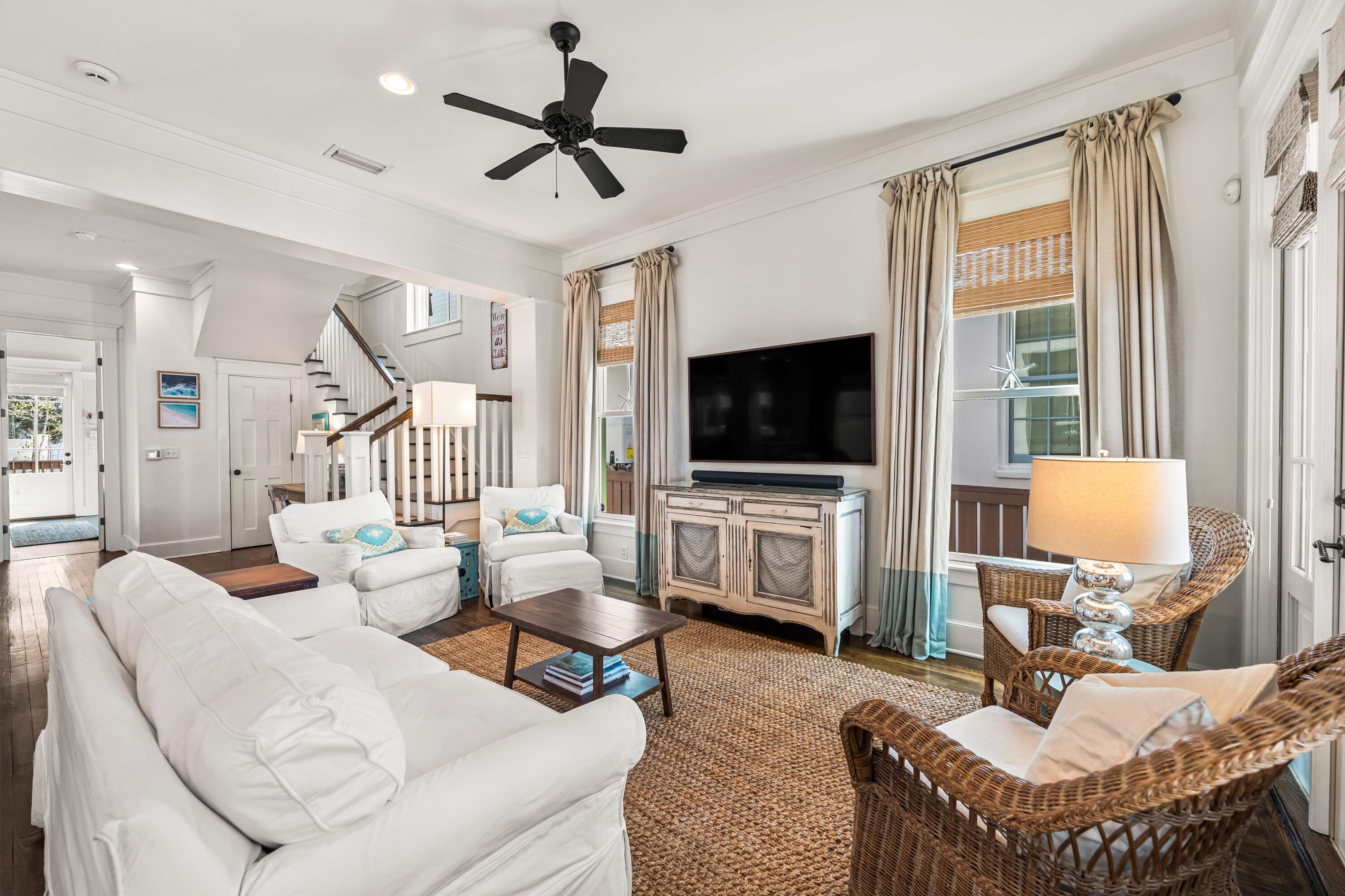 90 Atticus Road Rosemary Beach, FL 32461 - Photo 5 of 51 a living room with furniture and a flat screen tv
