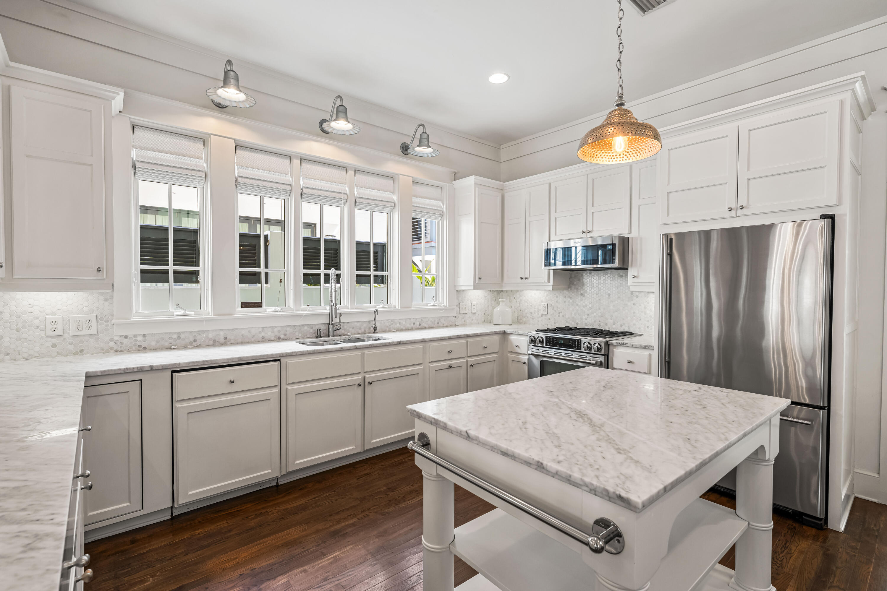 90 Atticus Road Rosemary Beach, FL 32461 - Photo 10 of 51 a kitchen with stainless steel appliances granite countertop a sink a stove a refrigerator and island