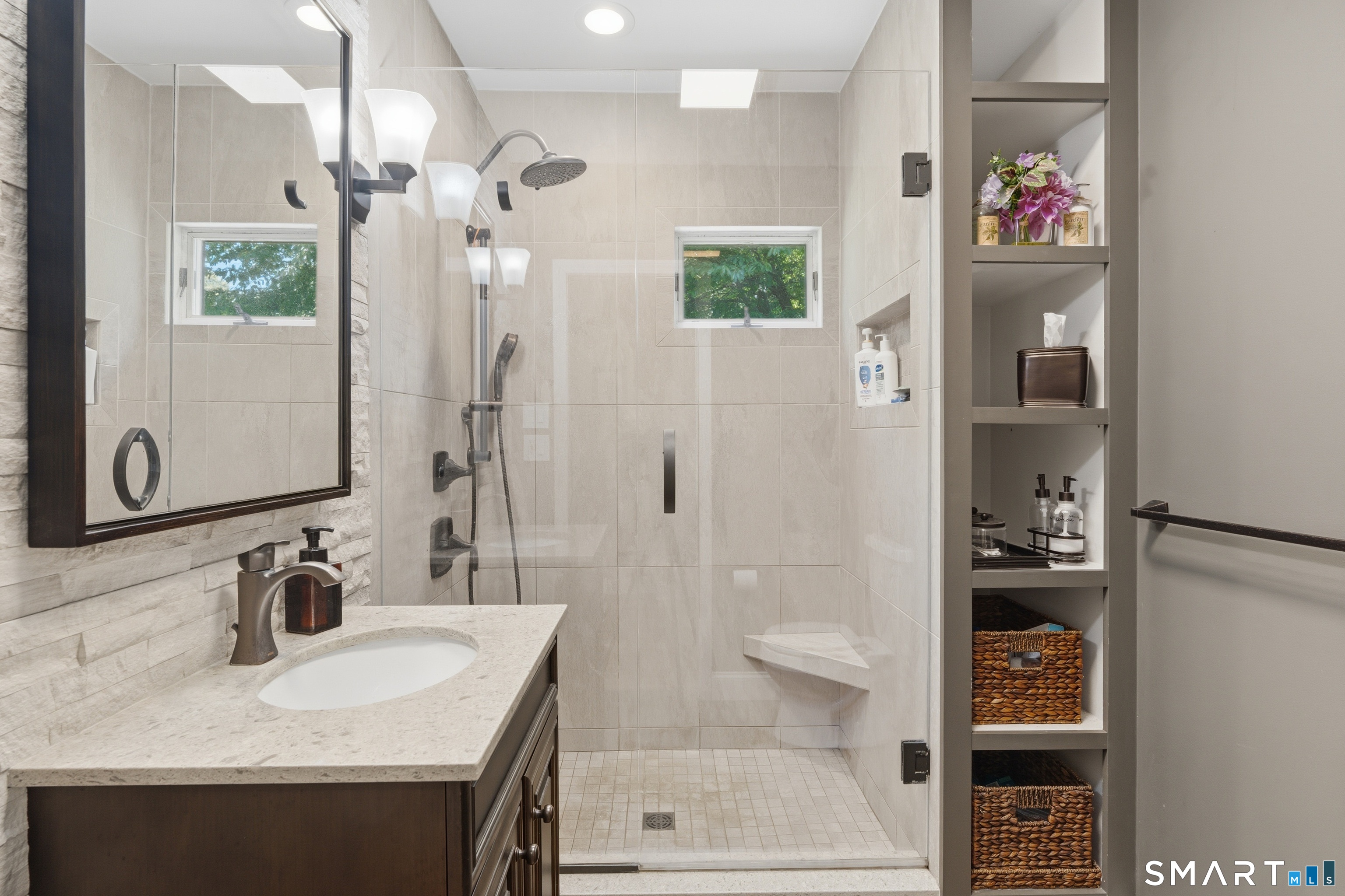 48 Case Road Burlington, CT 06013 - Photo 15 of 39 a bathroom with a sink double vanity and a shower