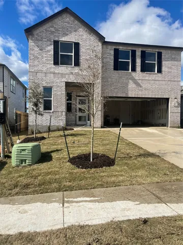 a house view with a outdoor space