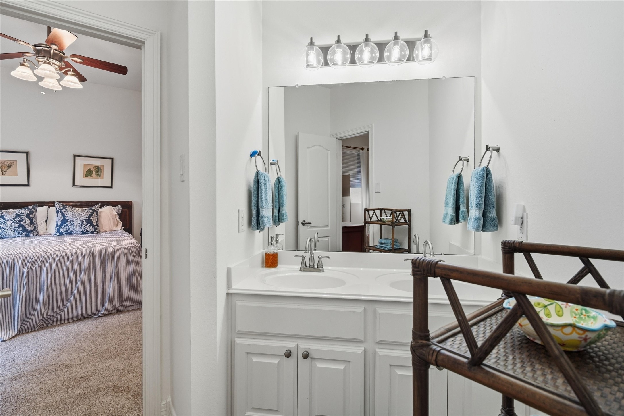 1558 Viejo Road League City, TX 77573 - Photo 19 of 28 Secondary bathroom featuring dual sinks, ample counter space, and updated lighting.
