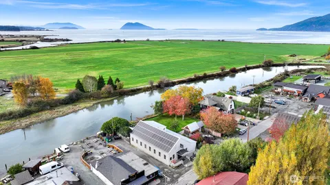 a view of a lake with a yard