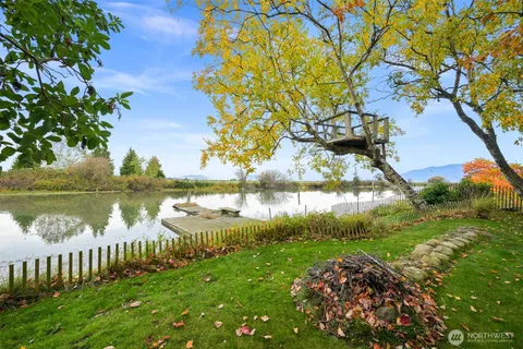 a view of a lake with a garden
