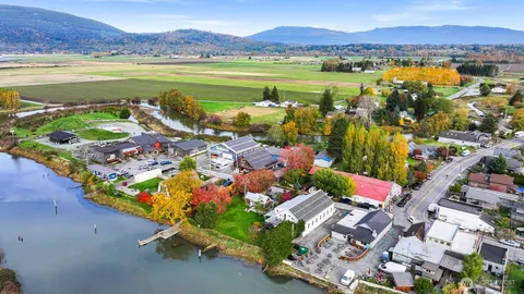 a view of an ocean and a mountain