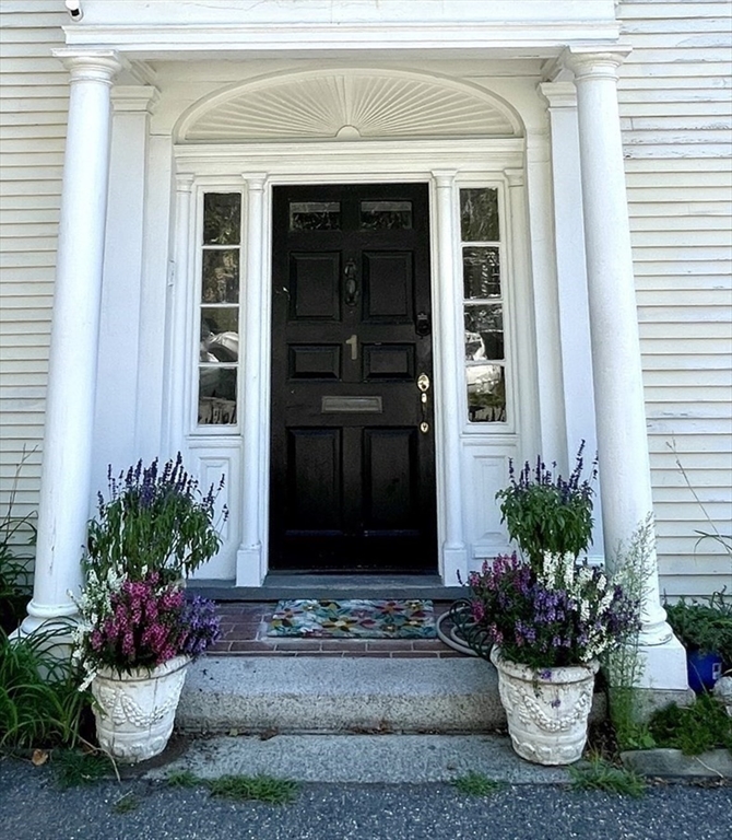 a view of a entryway door front of the house