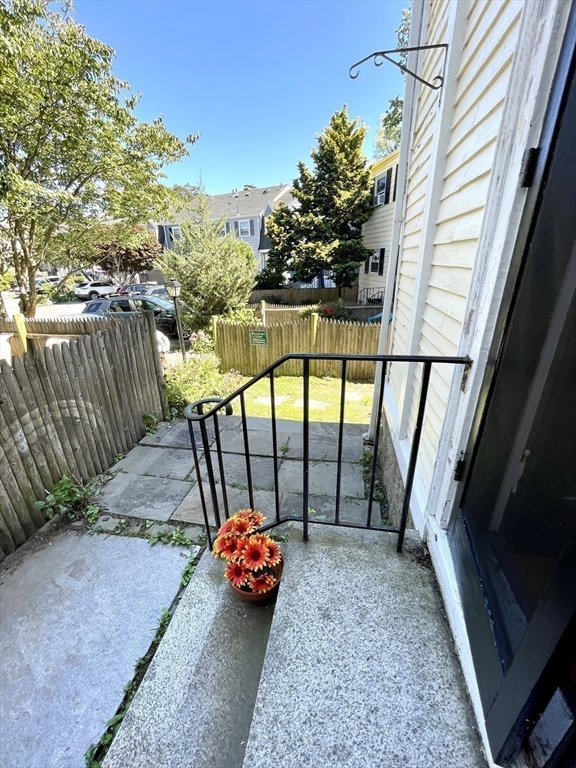 1 Green Street, Unit 2 Marblehead, MA 01945 - Photo 25 of 31 a view of a balcony with yard