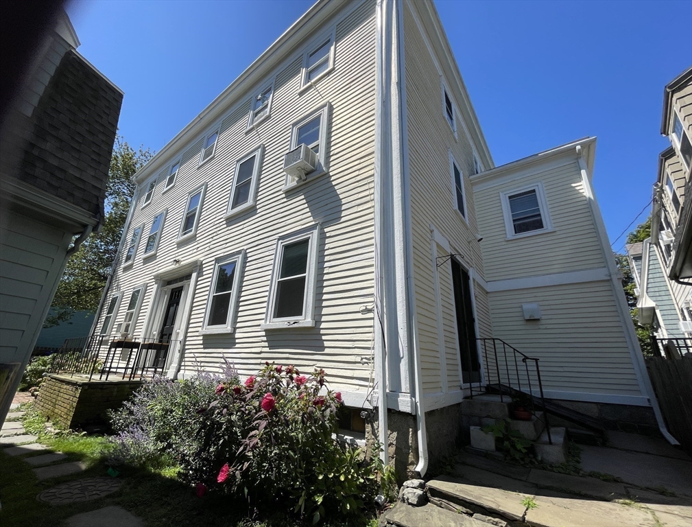 1 Green Street, Unit 2 Marblehead, MA 01945 - Photo 7 of 31 a view of a house with a yard