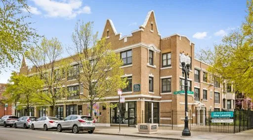 a view of a building and a street