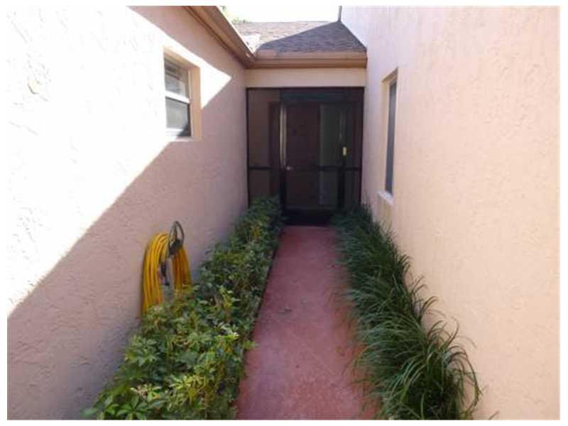 8062 Springside Court, Unit D Boca Raton, FL 33496 - Photo 3 of 32 Exterior Front
