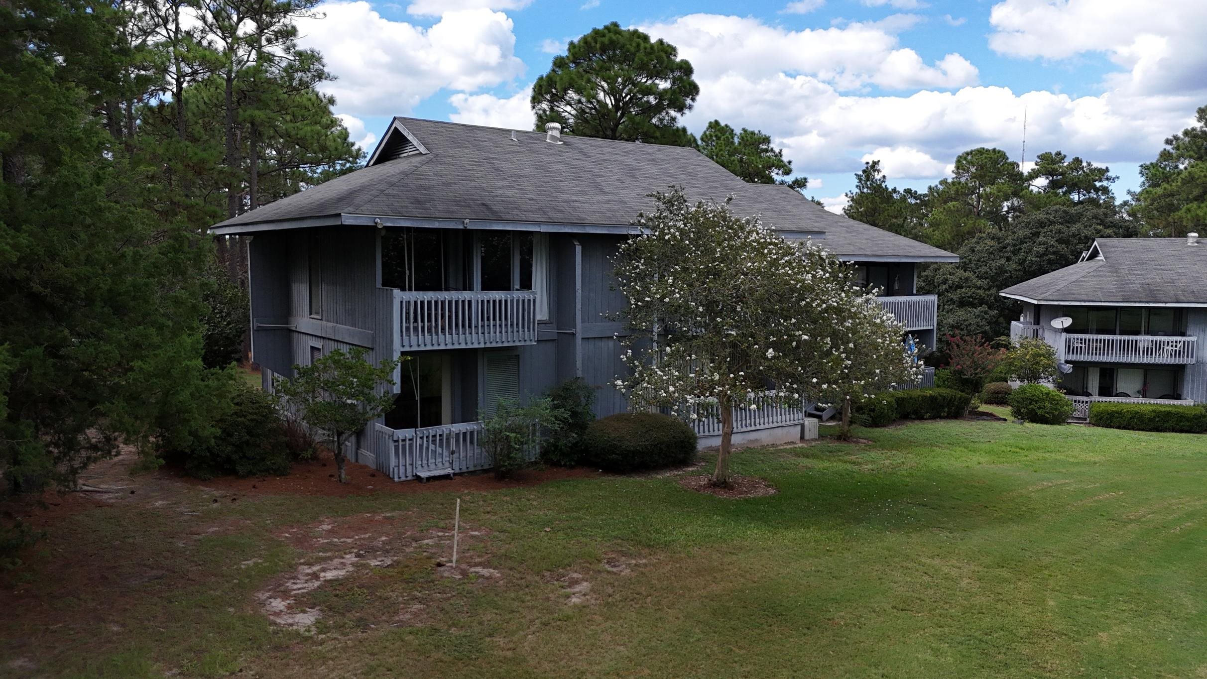 101 Golf Terrace, Unit 1A101 Daphne, AL 36526 - Photo 24 of 34 Back Of Structure