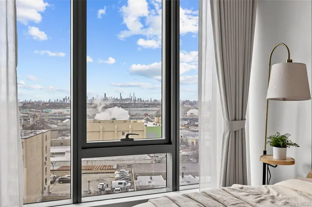 a view of a glass door with a balcony view