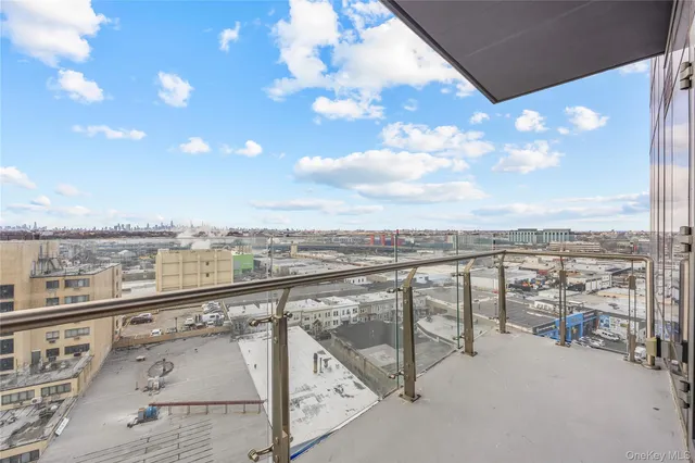 a view of a balcony with city view