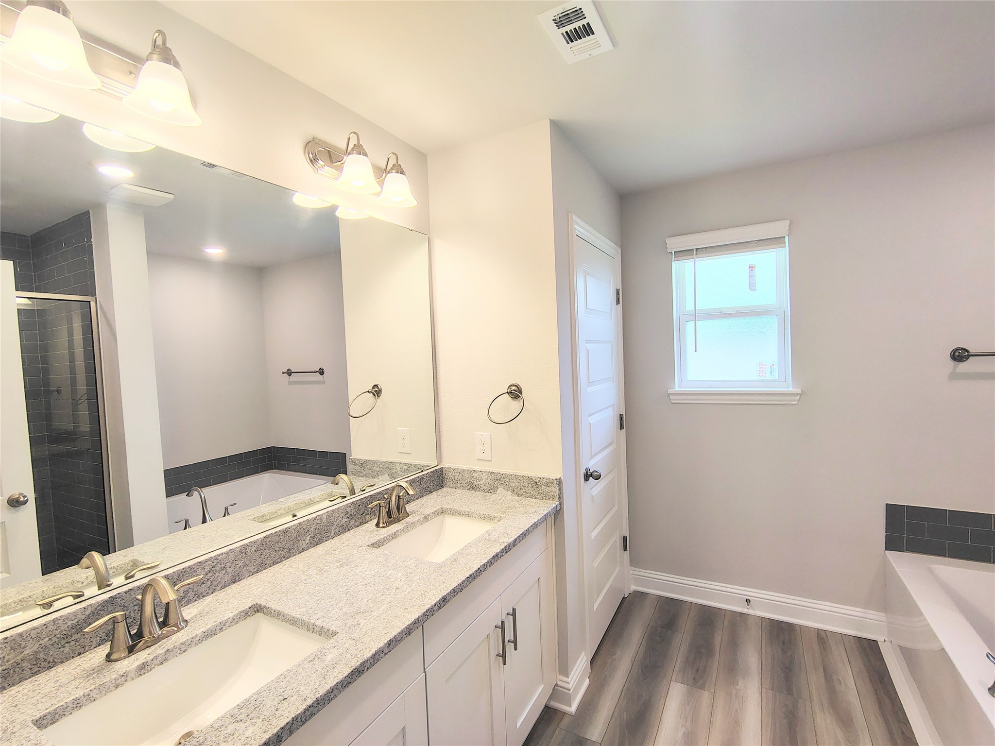 18 Gemstone Court Angleton, TX 77515 - Photo 11 of 24 STOCK PHOTO PRIMARY BATH