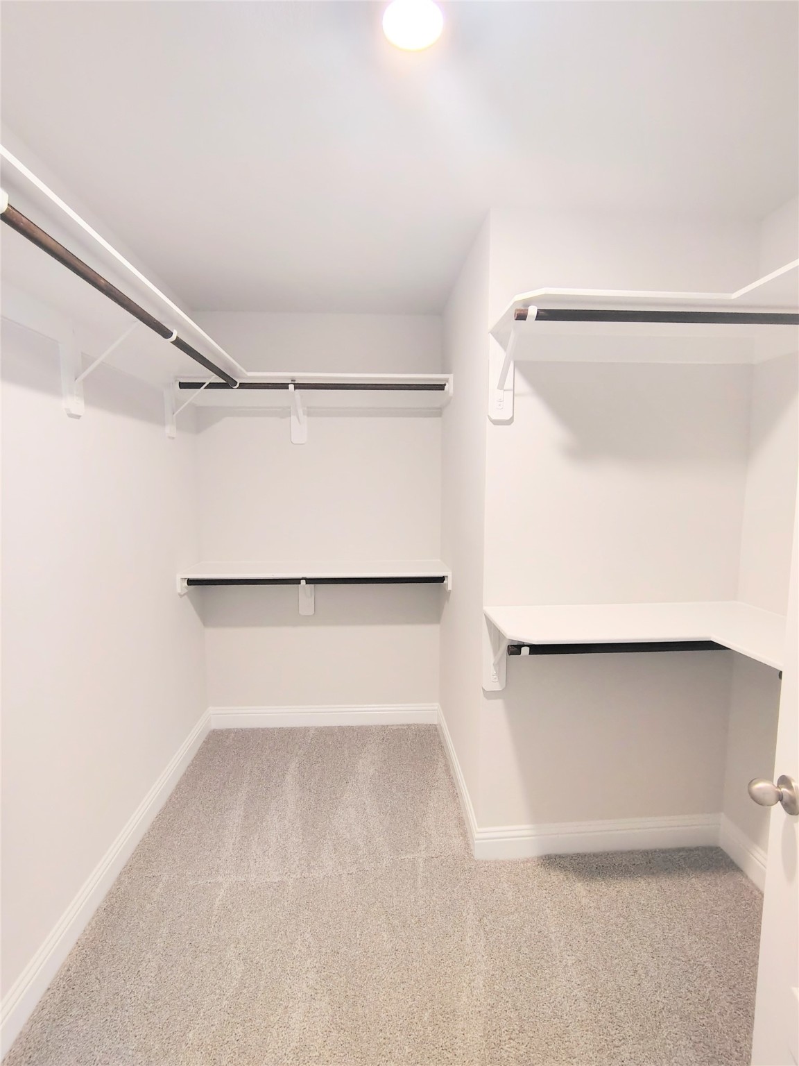 18 Gemstone Court Angleton, TX 77515 - Photo 15 of 24 STOCK PHOTO PRIMARY LARGE CLOSET