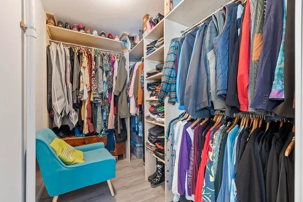 a bedroom with a workspace