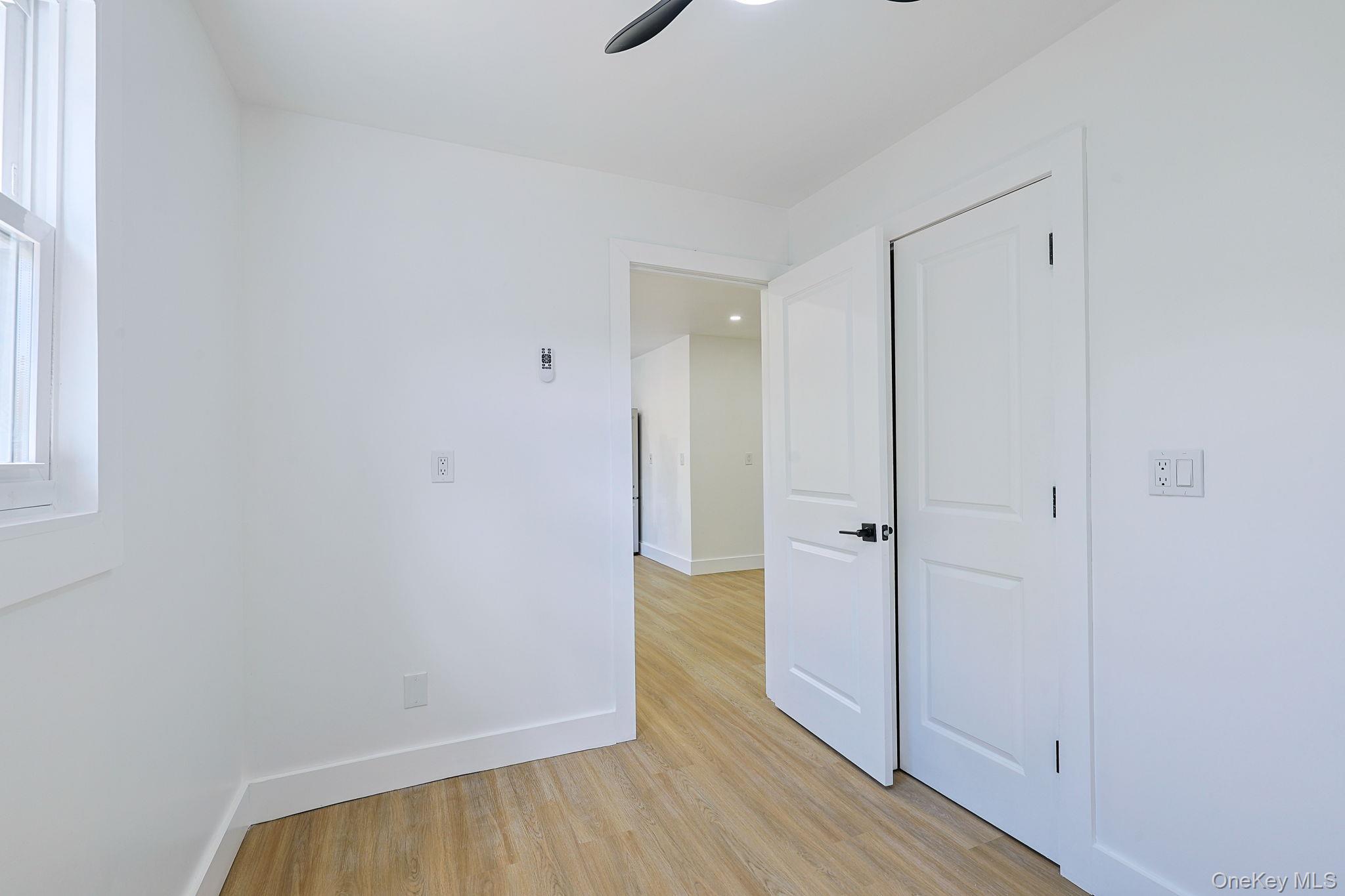 25 Overlook Road Woodbourne, NY 12788 - Photo 11 of 22 a view of a hallway with wooden floor