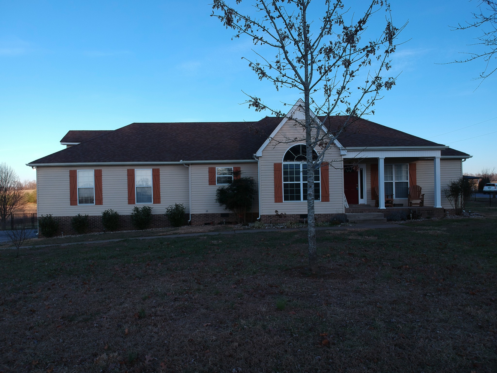 6183 H B Lee Road Springfield, TN 37172 - Photo 3 of 23 a front view of a house with a garden